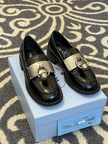 Prada Black Brushed leather loafers with metal details