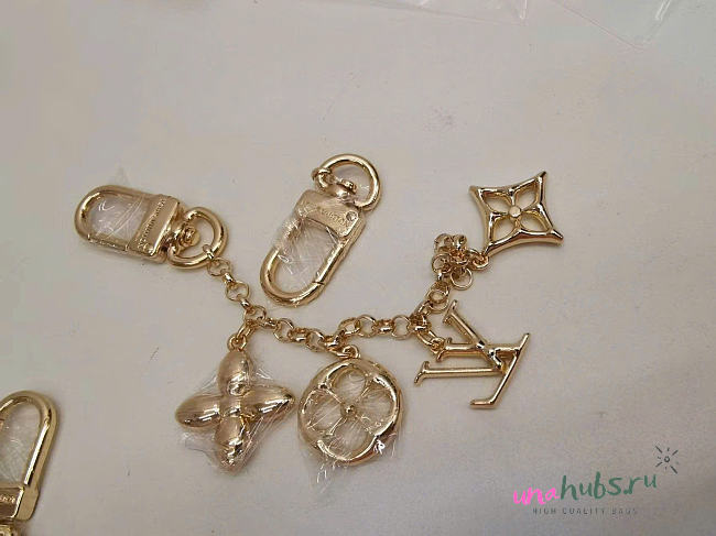 Louis Vuitton Bag Hangging Gold  - 1