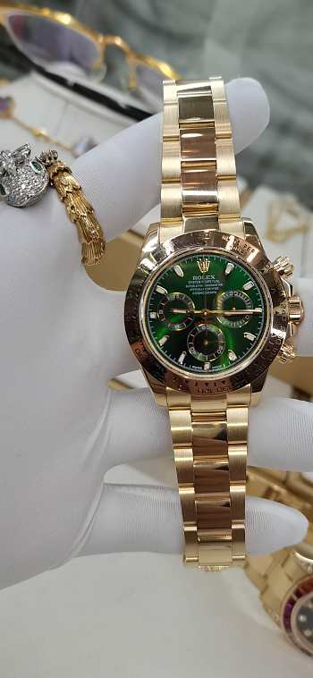 Rolex Cosmograph Daytona watch Gold/Green gold 40mm