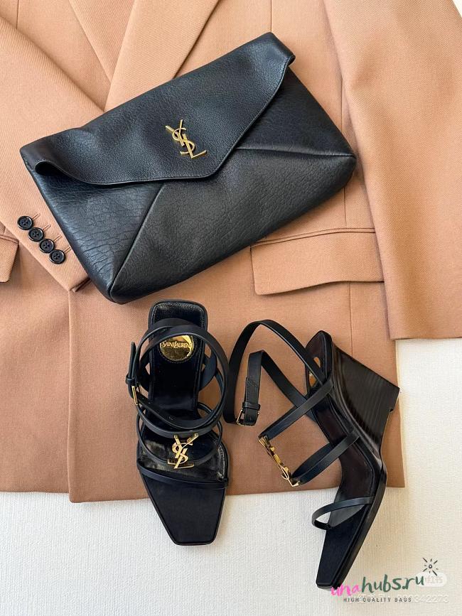 YSl Cassandra 90 leather wedge sandals in black - 1