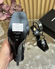 YSl Cassandra 90 leather wedge sandals in black patent - 5