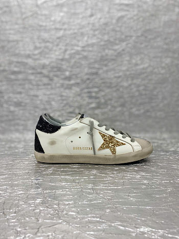 Golden goose superstar sneakers with gold star 